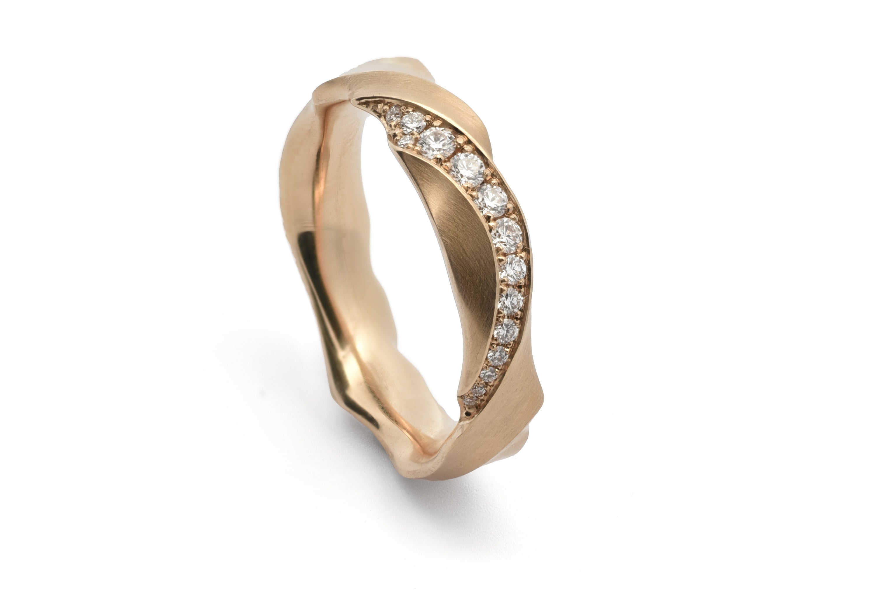 diamond set ripple ring in rose gold.
