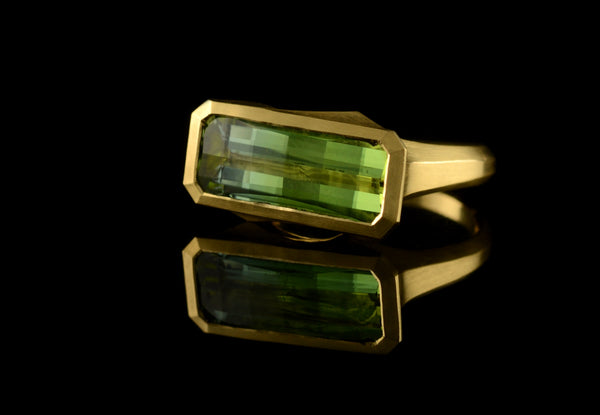 Carved yellow gold Arris ring with green tourmaline