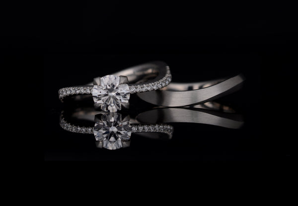 Bespoke diamond engagement ring with fitted wedding band