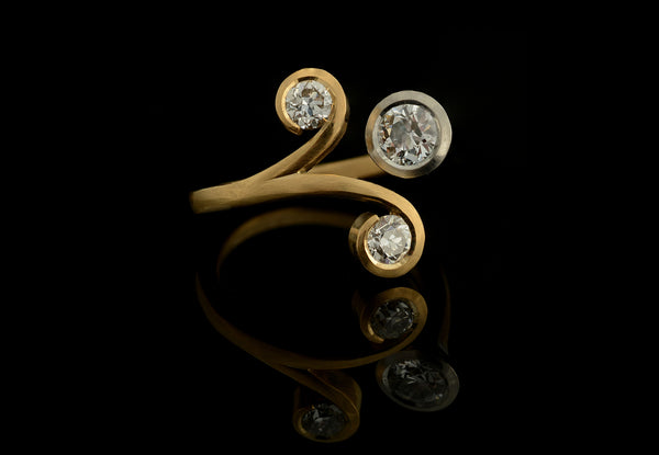 Forged yellow gold and platinum three-stone cocktail ring with old-cut diamonds