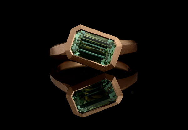 Carved rose gold with emerald-cut mint green tourmaline Arris ring