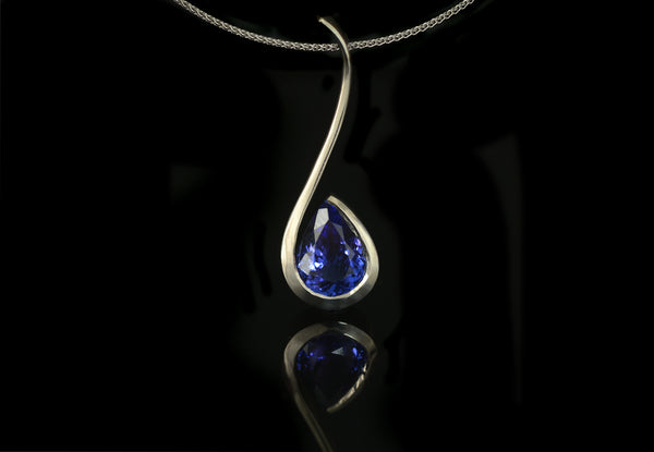 Forged white gold and tanzanite pendant commission