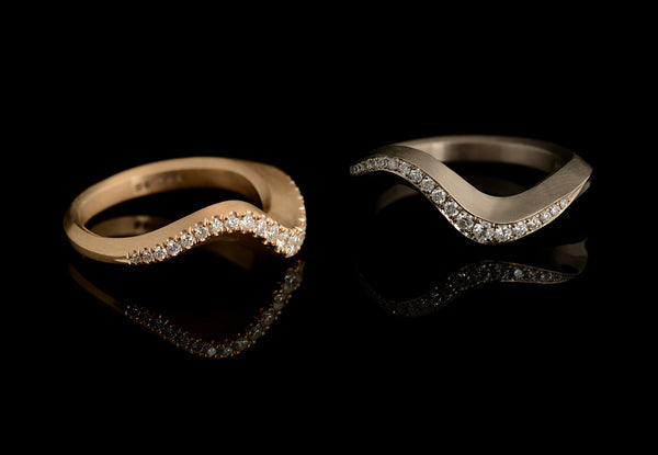 Arris carved rings with pave and castelle diamonds