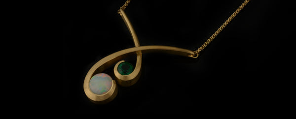 Opal and emerald yellow gold twist pendant