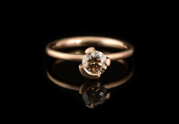Asymmetric claw rose gold and cognac diamond engagement ring