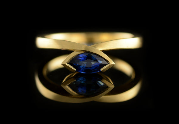Marquise sapphire and yellow gold engagement ring commission