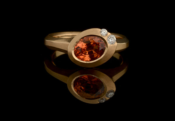 Carved rose gold Arris ring with orange sapphire and white diamonds