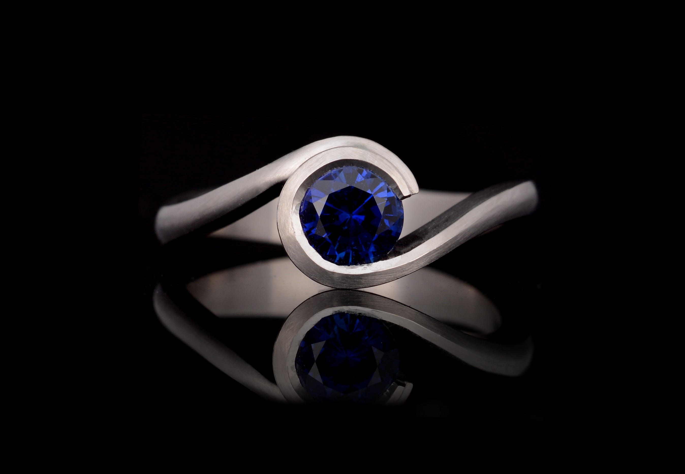 Sapphire Platinum wave engagement ring