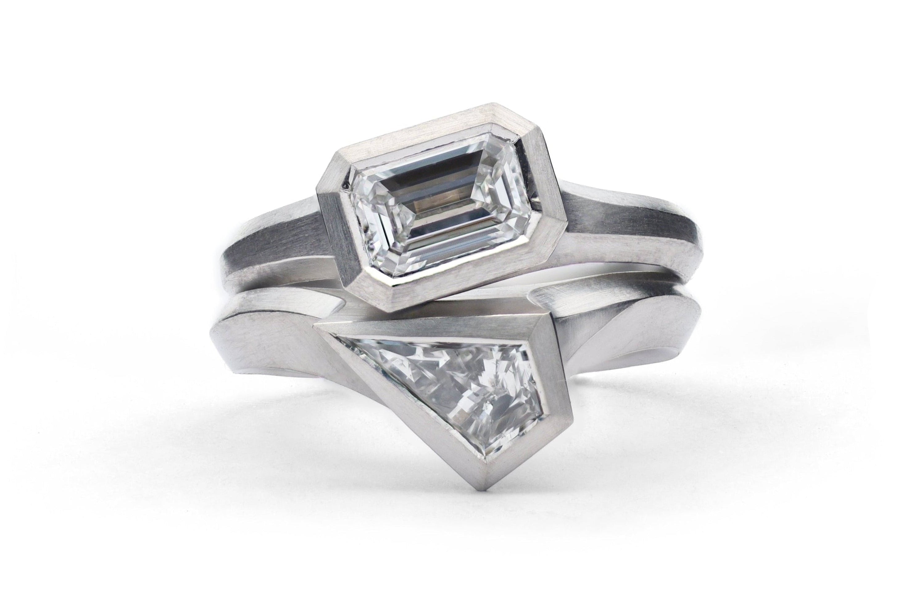 Platinum Aegis fitted ring set with kite shaped diamond