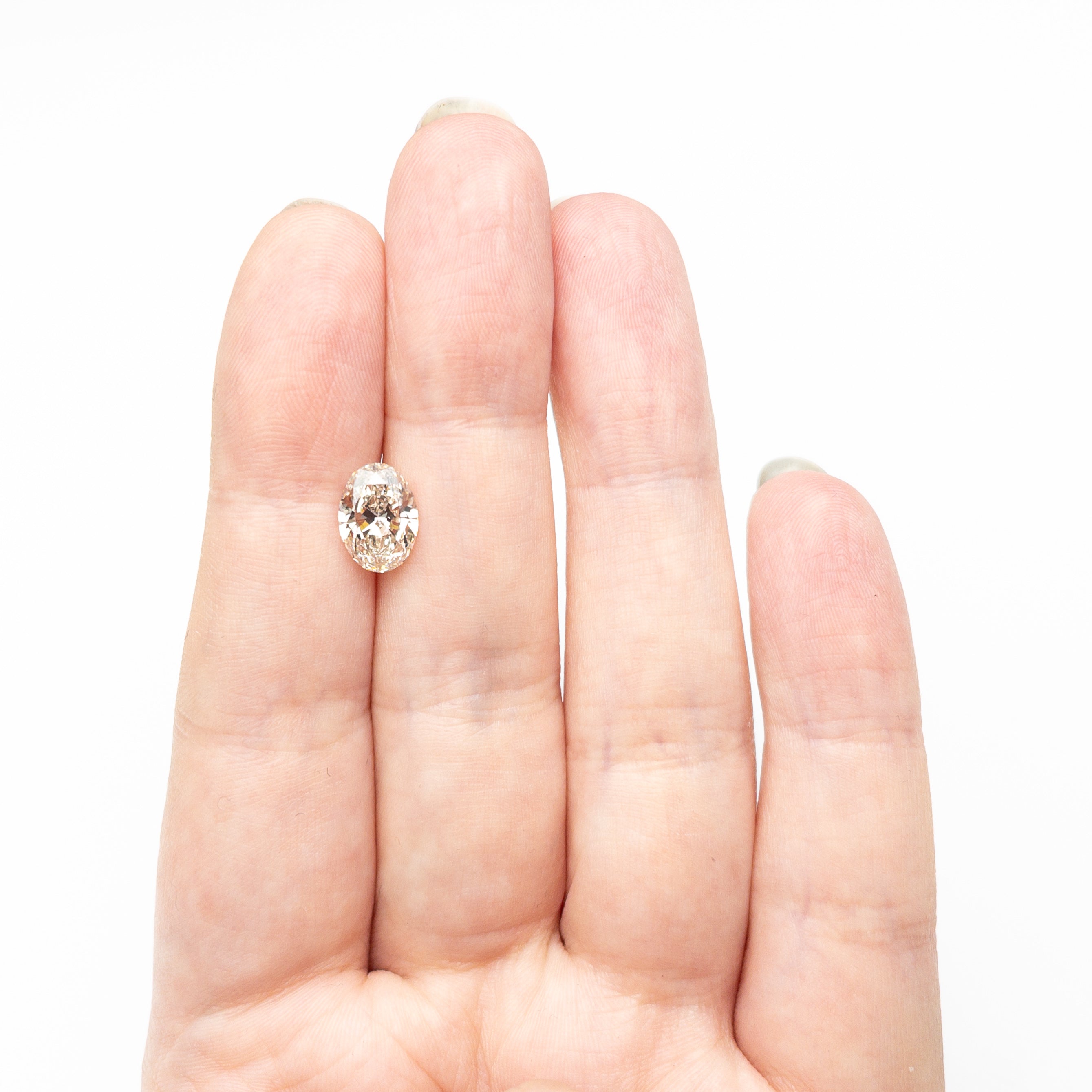 2.01ct 9.74x7.01x4.32mm SI1 O-P Champagne Oval Brilliant 27365-01