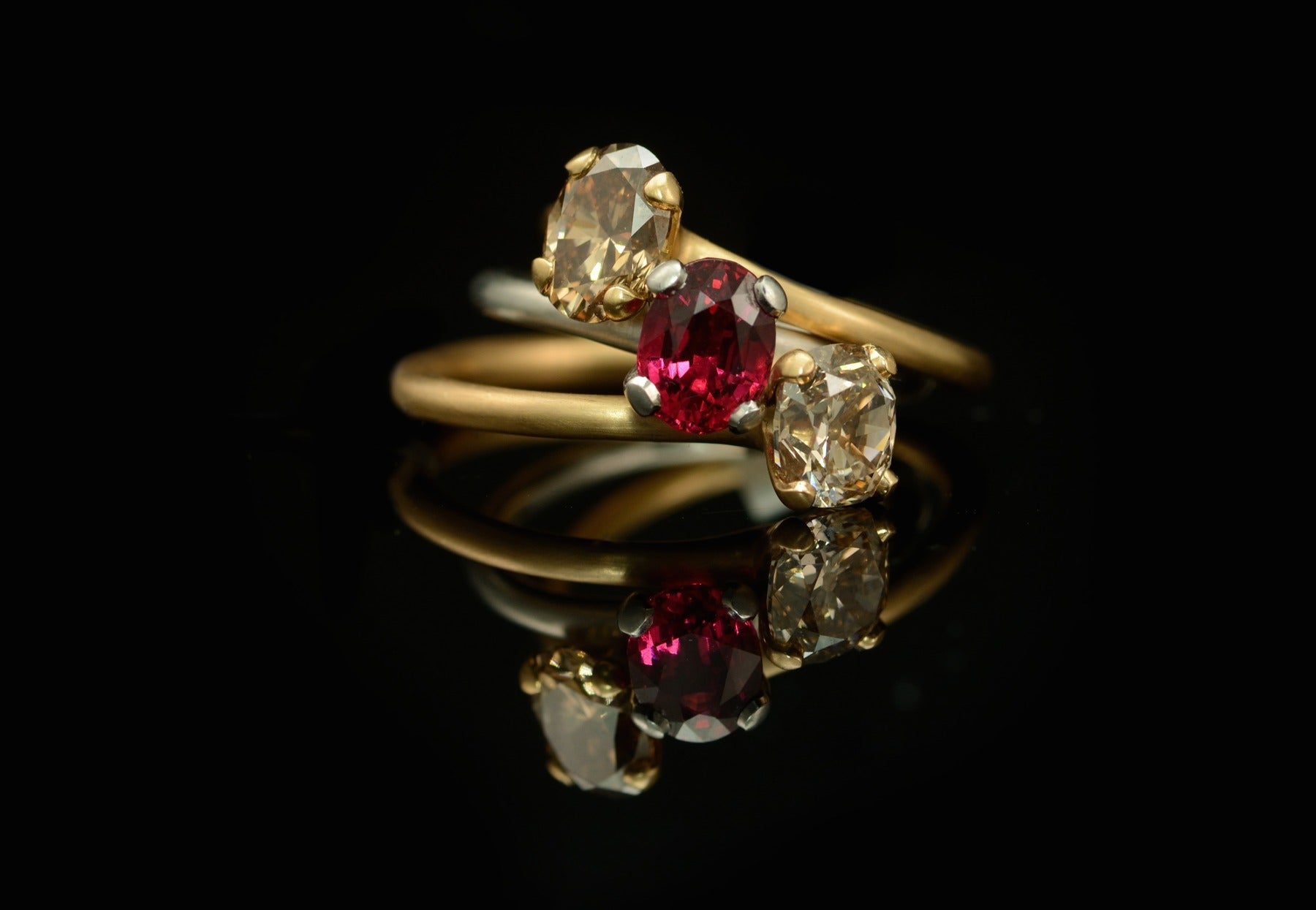 4 claw oval cognac, ruby and yellow diamond gold engagement rings