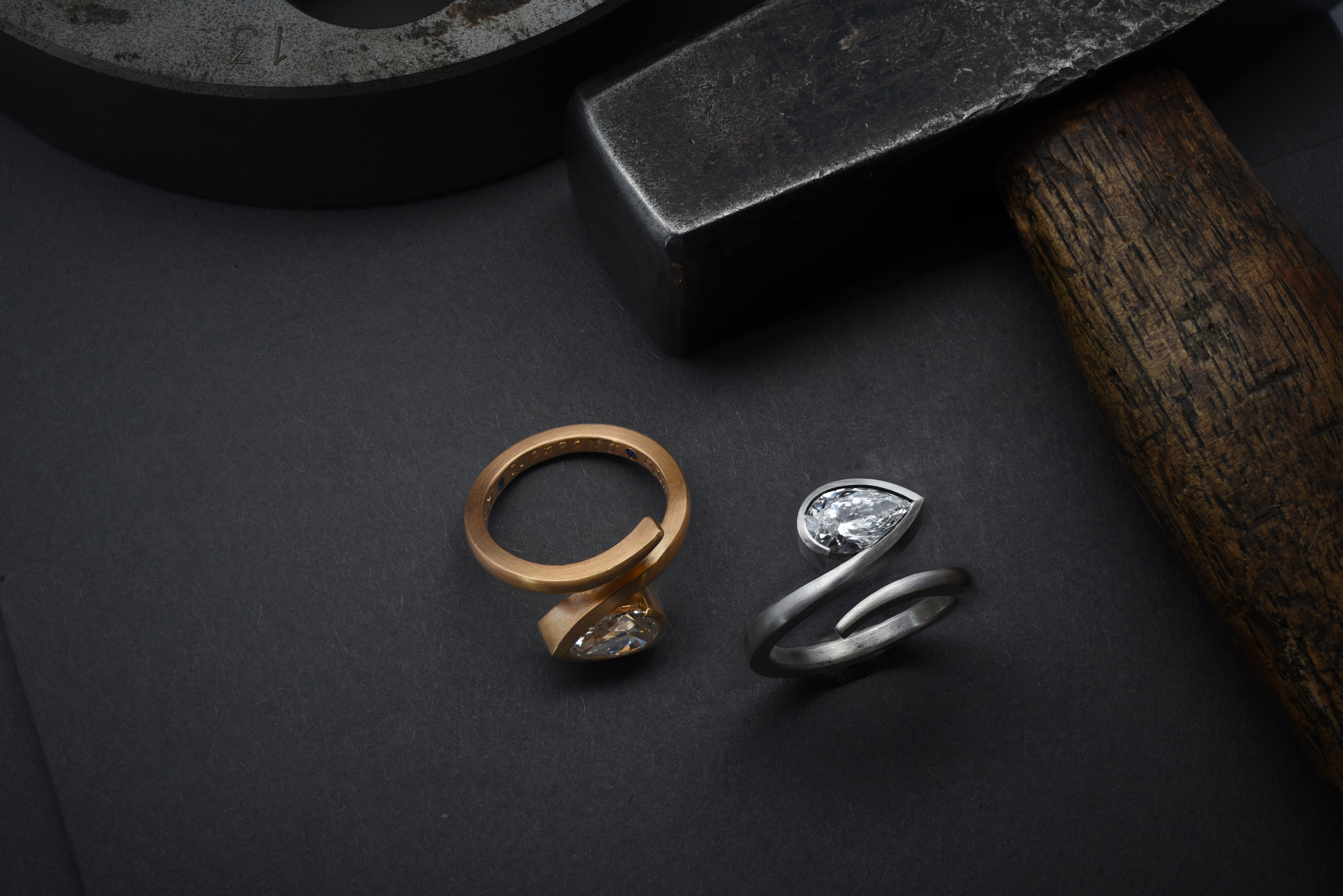 White diamond and platinum 'Twist' engagement ring