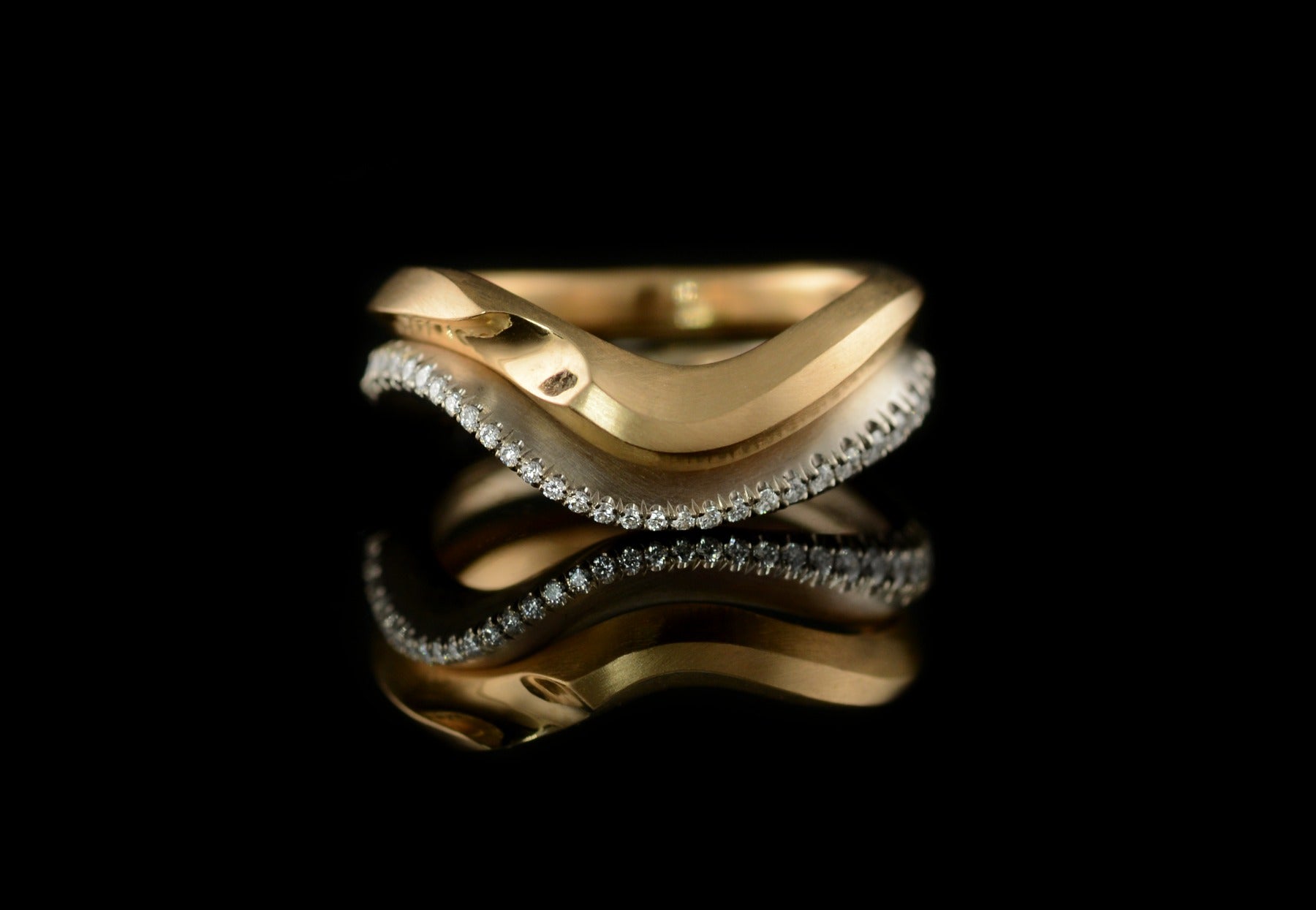 Arris carved yellow gold wedding ring and white gold castelle set white diamond wedding ring