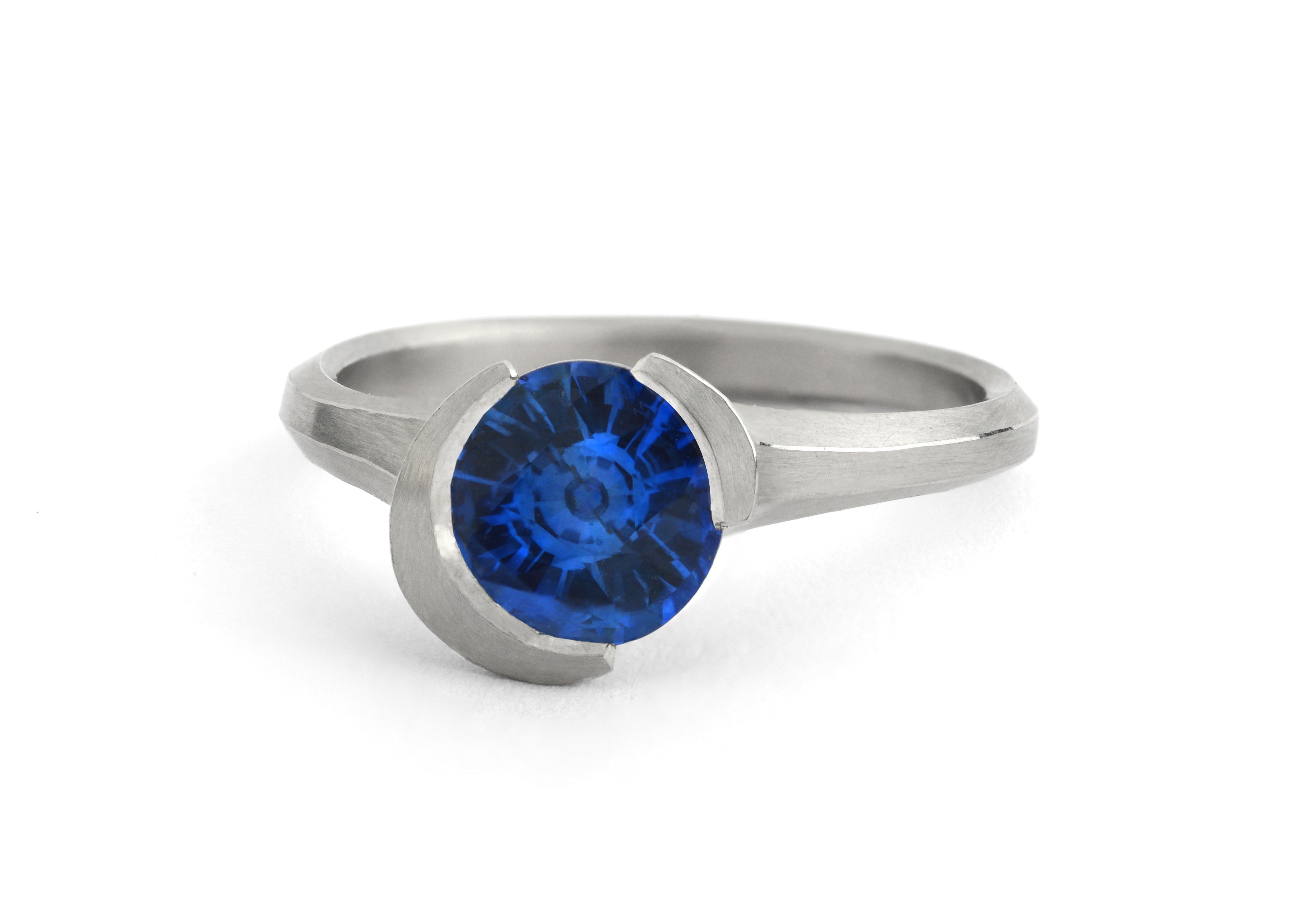 Arris carved platinum and sapphire ring