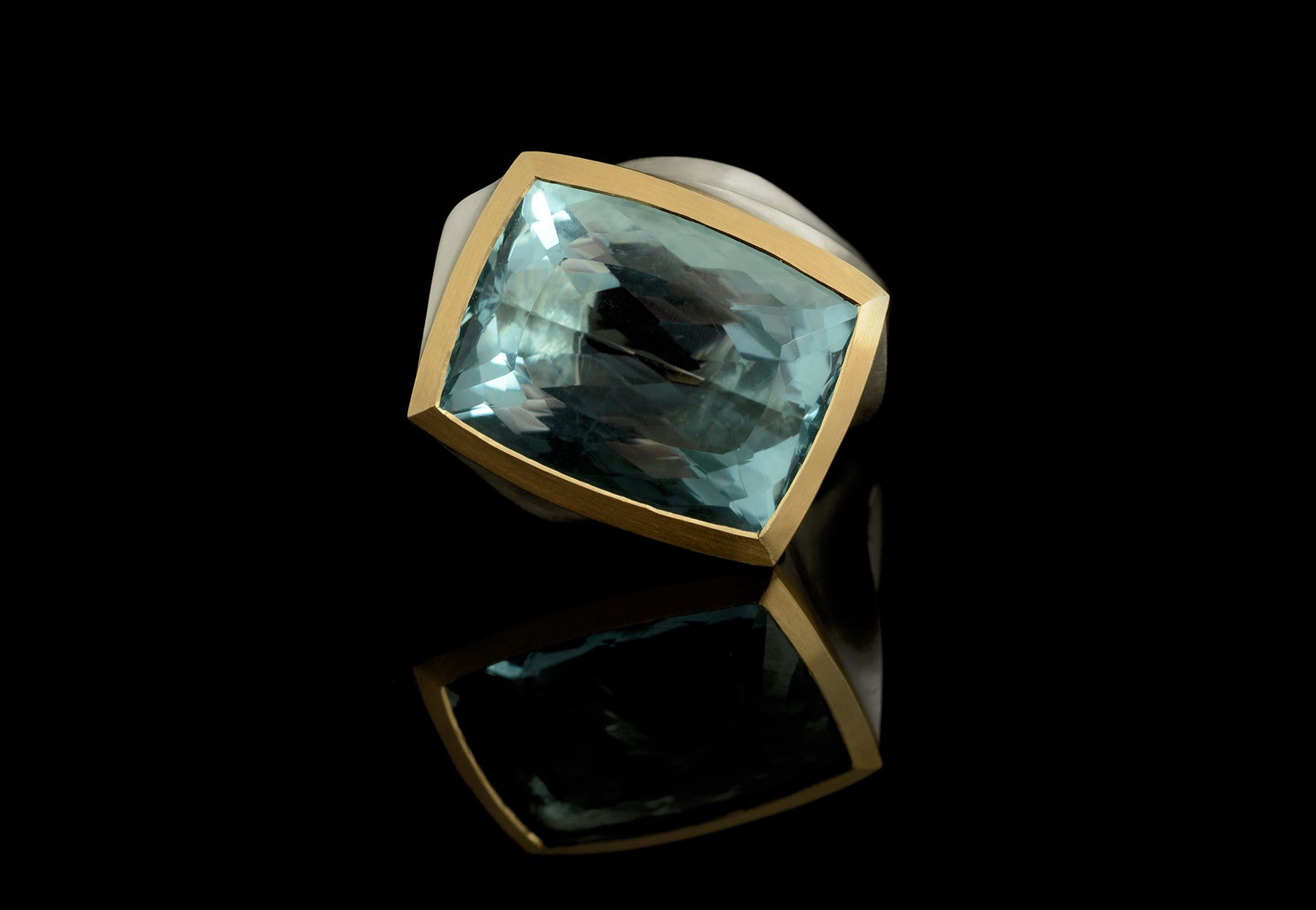 Arris blue gemstone silver and gold ring