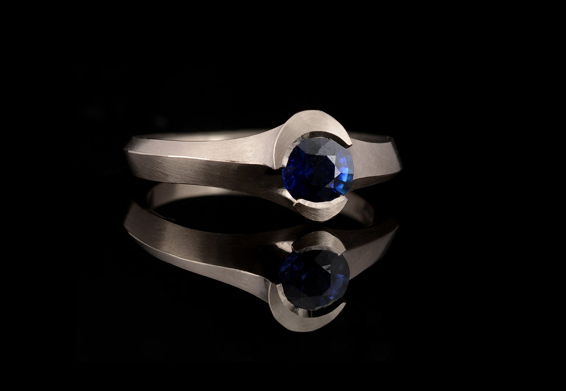 Arris blue sapphire white gold engagement ring