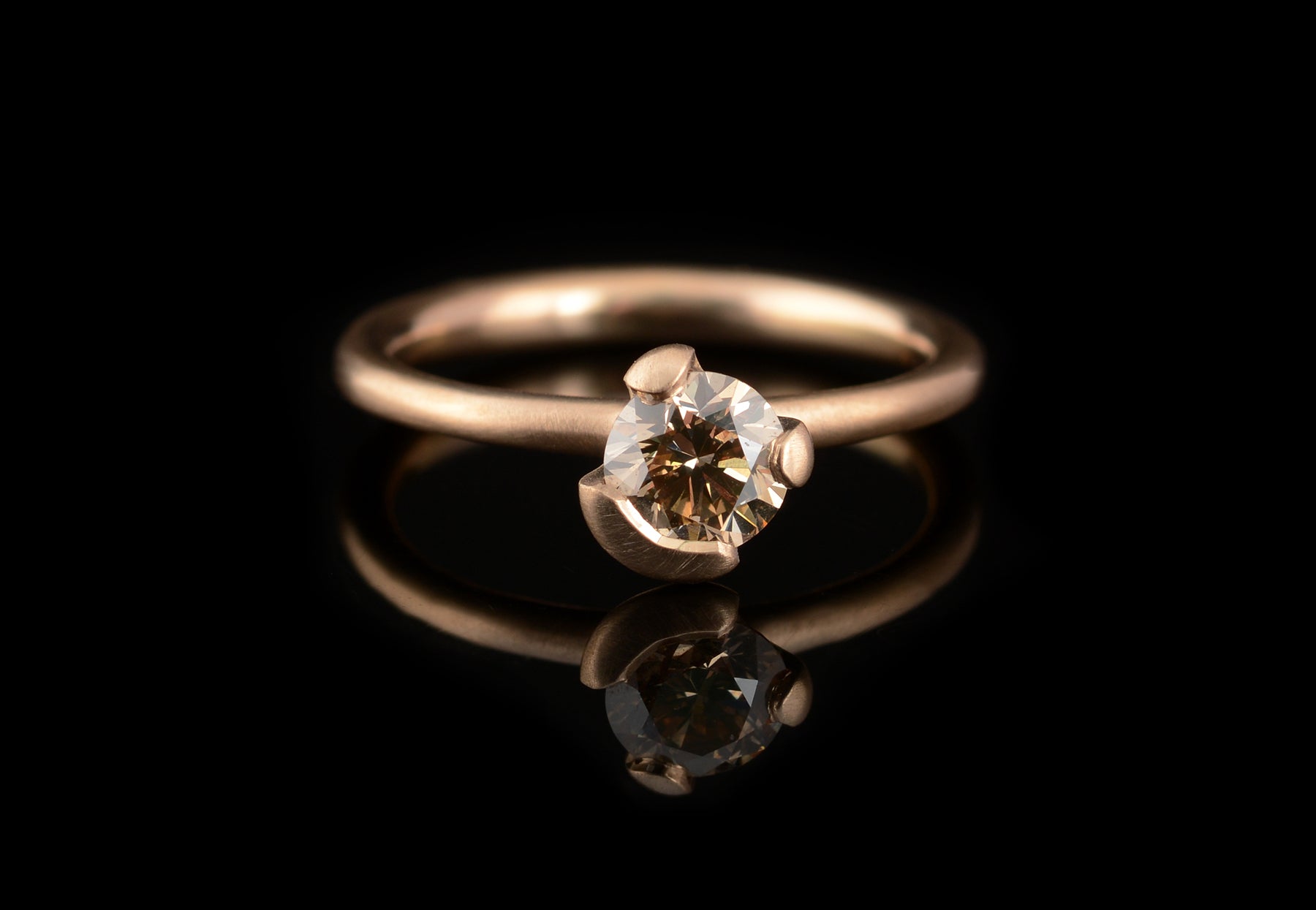 Asymmetric cognac diamond rose gold engagement ring