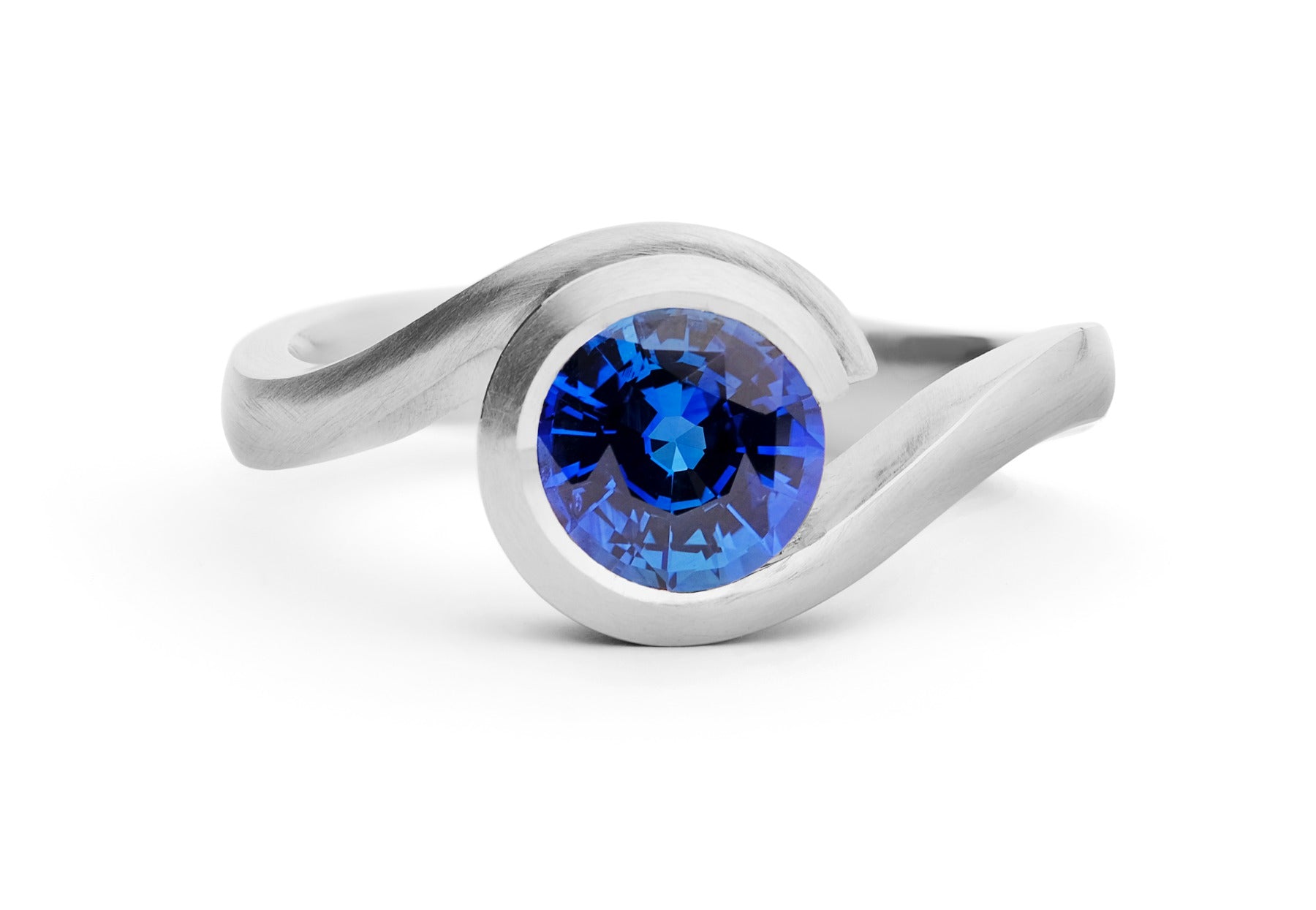 Wave blue sapphire platinum engagement ring