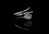 'Twist' Platinum and white pear shaped rose cut diamond engagement ring