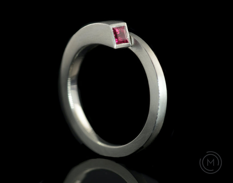 Wrapover ruby and platinum all in one engagement and wedding ring