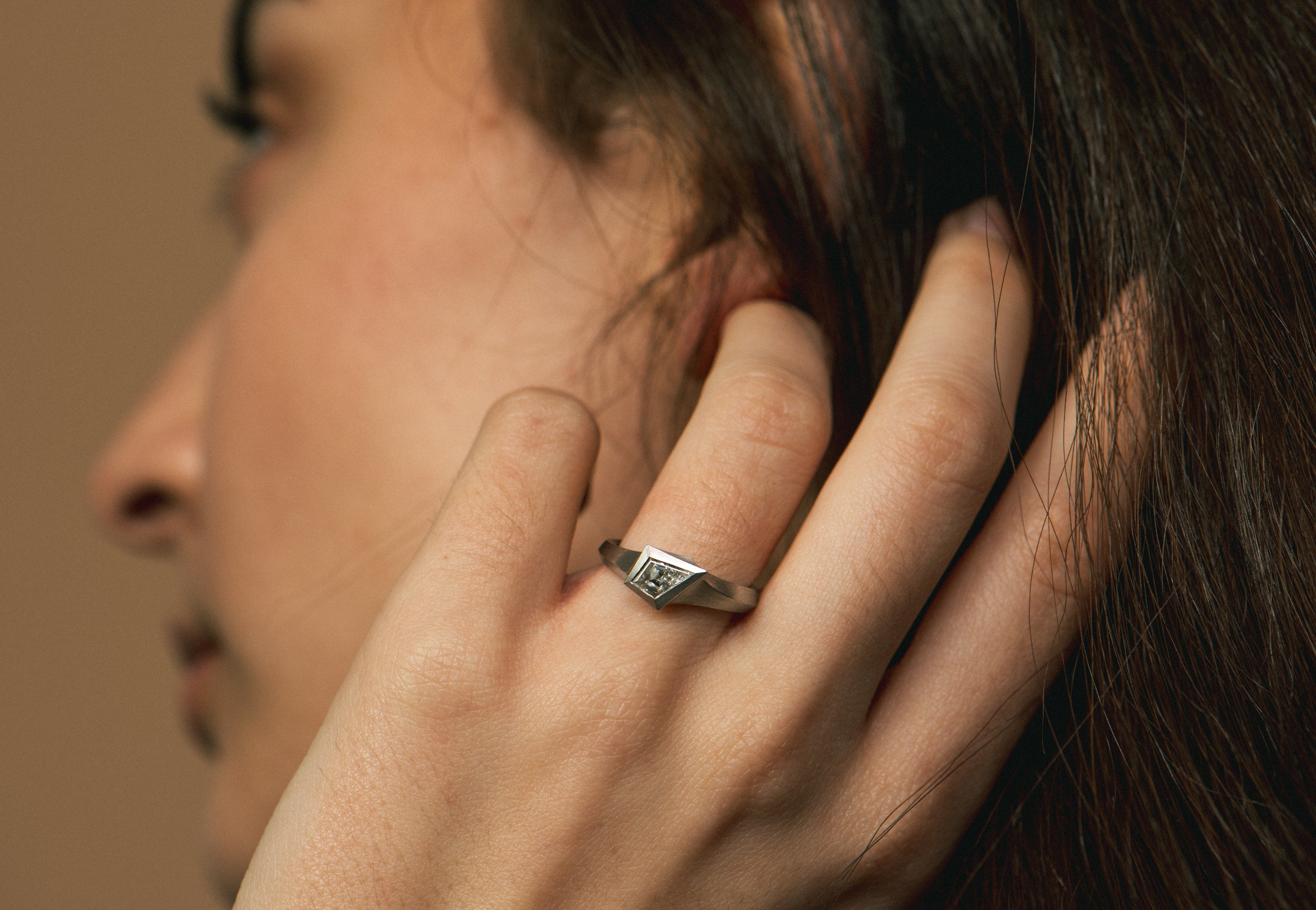 Aegis ring with kite shaped diamond