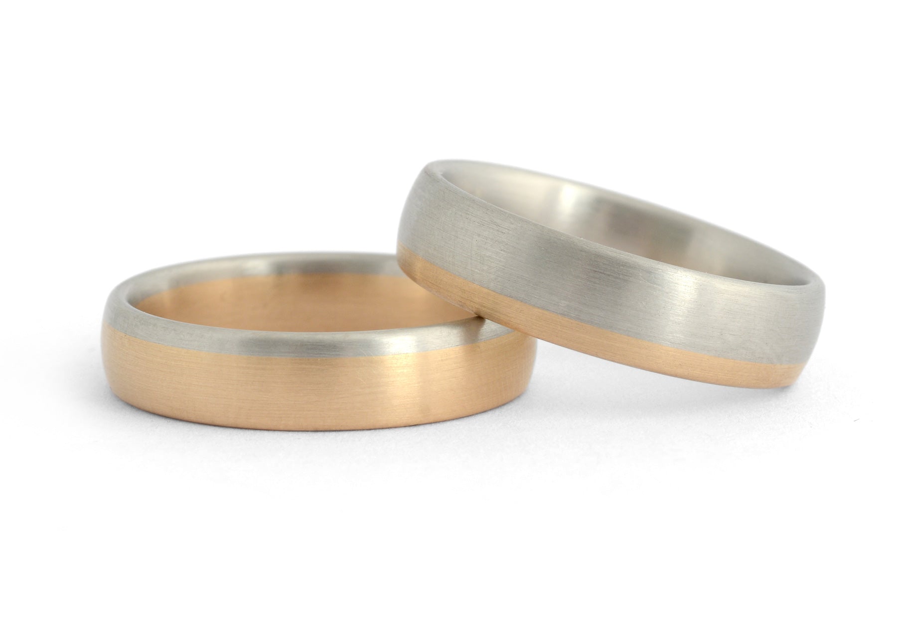 Bi-metal deep curve platinum and rose gold mens wedding rings