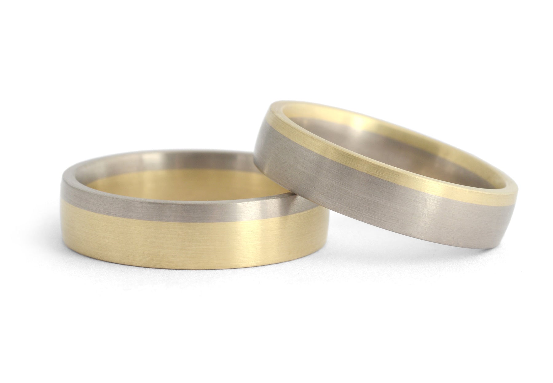 Bi-metal deep curve platinum and yellow gold mens wedding rings
