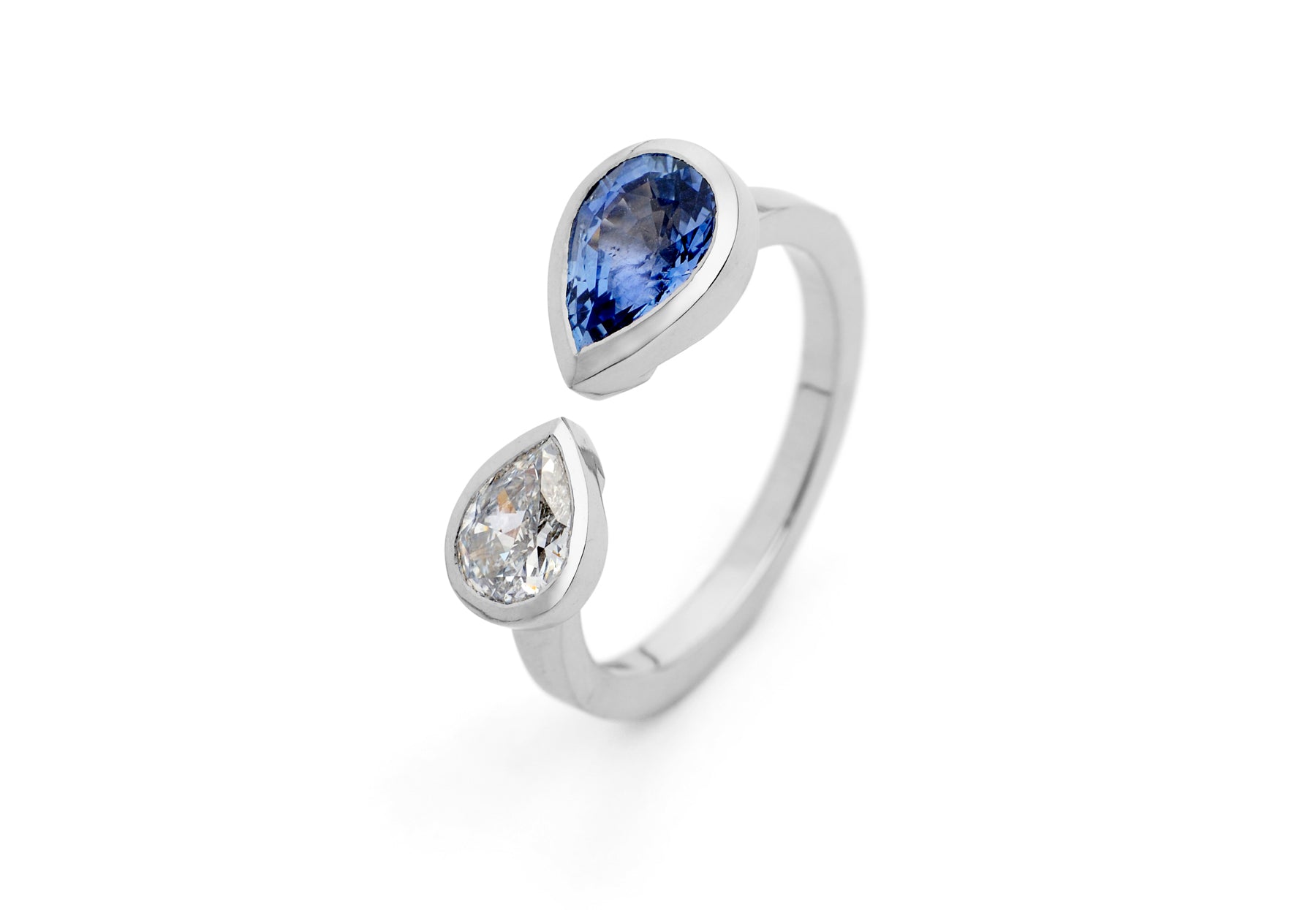 Pear shape two stone blue sapphire white diamond platinum engagement ring