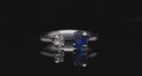 Platinum two-stone sapphire and diamond engagement ring