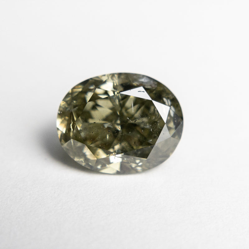 2.61ct 9.52x7.64x4.73mm I1 Fancy Greenish Yellow Chameleon Oval Brilliant 18840-01 - Misfit Diamonds