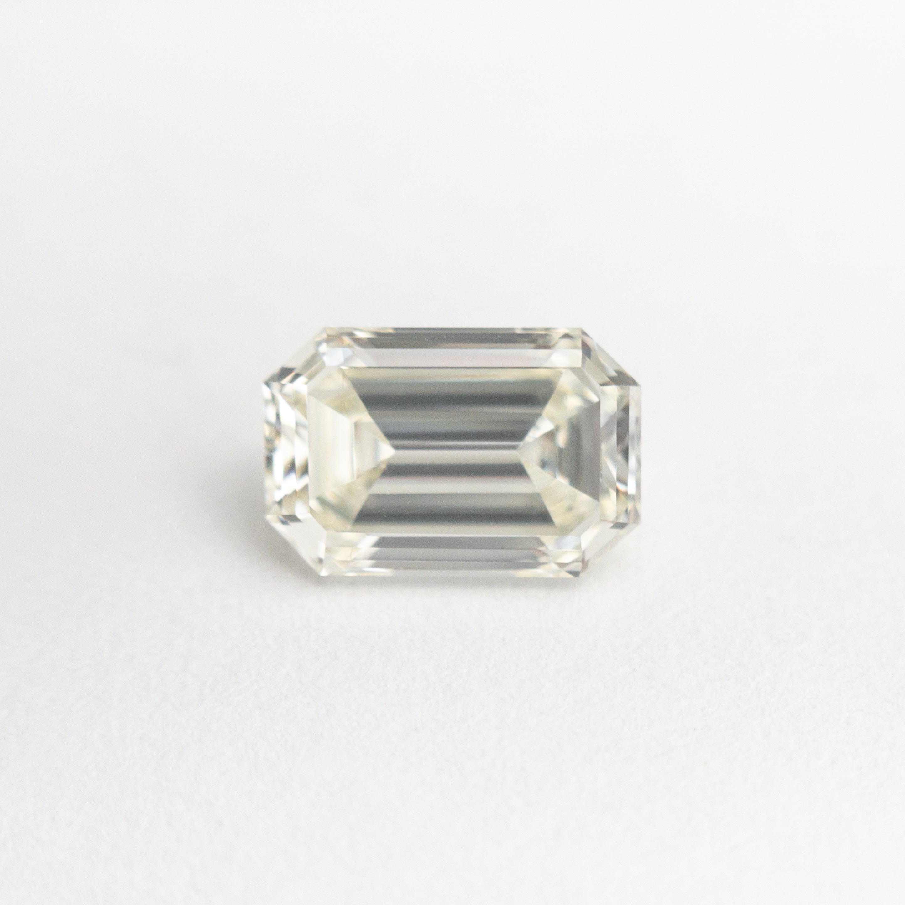 1.06ct 7.60x4.98x3.11mm VS1 O-P Antique Emerald Cut 19432-01-McCaul