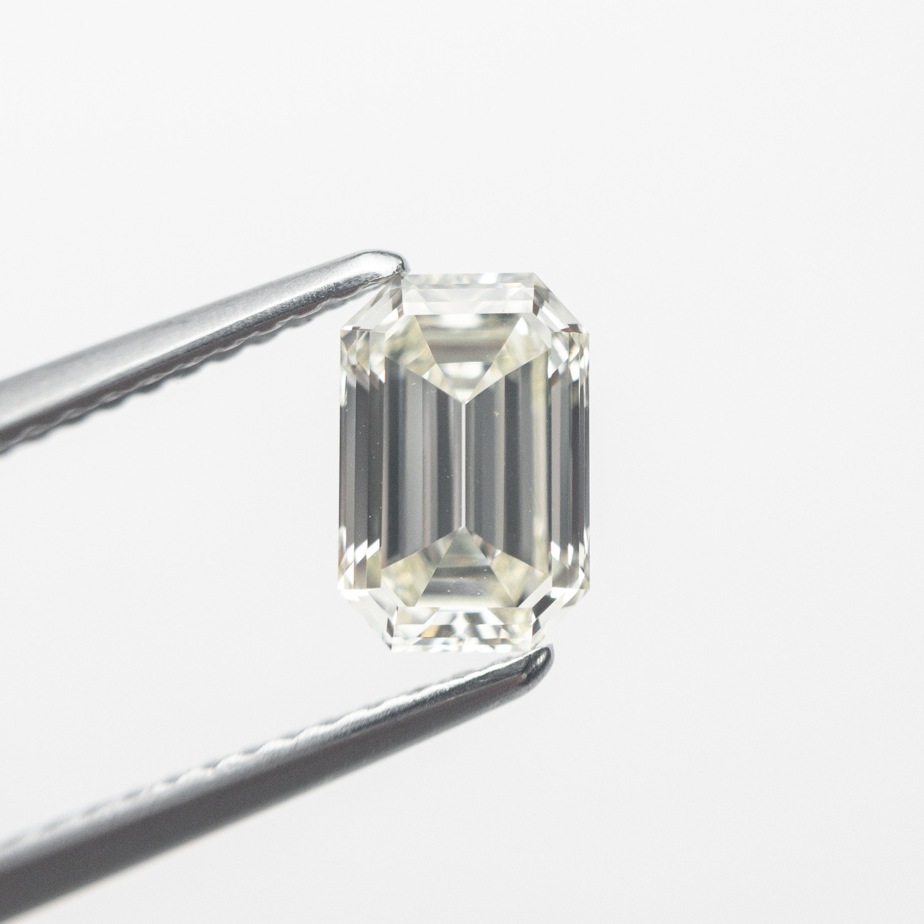 1.06ct 7.60x4.98x3.11mm VS1 O-P Antique Emerald Cut 19432-01-McCaul