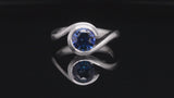 Platinum and blue sapphire Wave engagement ring