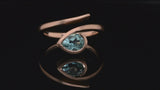 Rose gold Twist engagement ring with pear Paraiba tourmaline