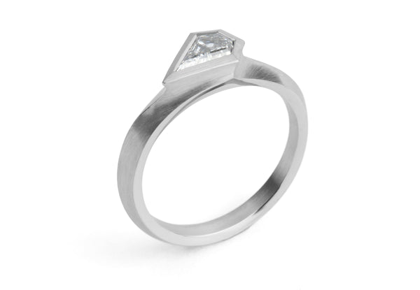 Aegis ring with shield shaped diamond