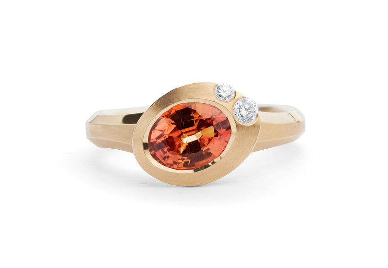 Arris carved rose gold ring with oval orange sapphire and white diamonds
