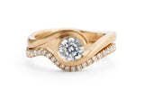 Rose gold and white diamond Wave engagement ring with fitted diamond wedding band