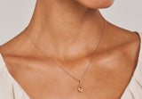 Twist-pendent-rose-gold-pear-shape-mandarin-garnet-on-model