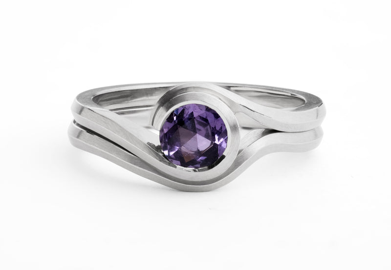 Platinum and violet sapphire wave engagement ring-McCaul