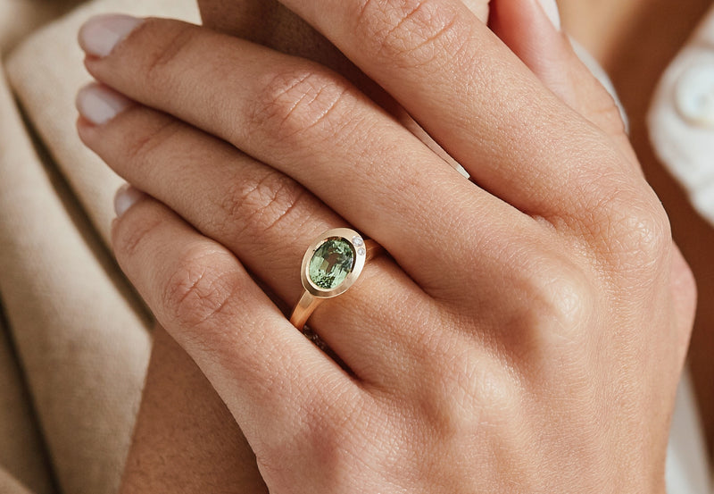 Rose gold Arris ring with oval tsavorite garnet and two white diamonds-McCaul