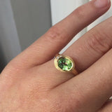 Rose gold Arris ring with oval tsavorite garnet and two white diamonds