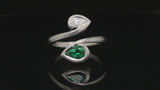 Emerald and diamond Double Twist ring