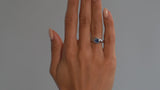 Platinum Arris ring with emerald cut sapphire