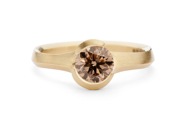 Hand carved rose gold Arris ring with round cognac diamond