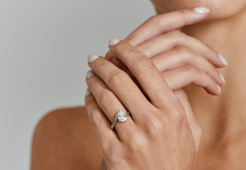 Wave platinum pear shape diamond engagement ring-McCaul