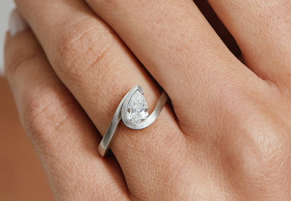 Wave platinum pear shape diamond engagement ring-McCaul
