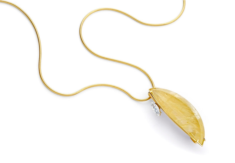Yellow gold, rutilated quartz and diamond pendant